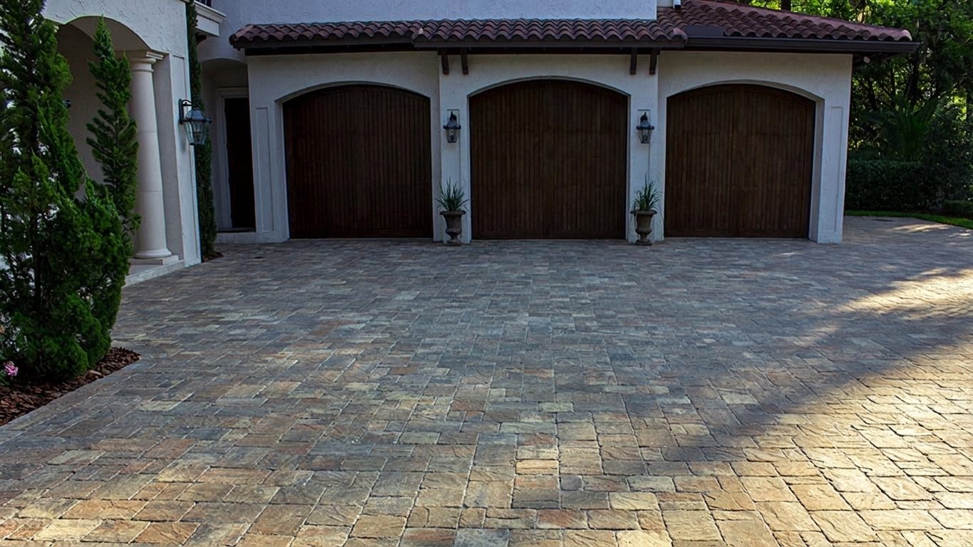 Tumbled concrete paver driveway, 3-car entry