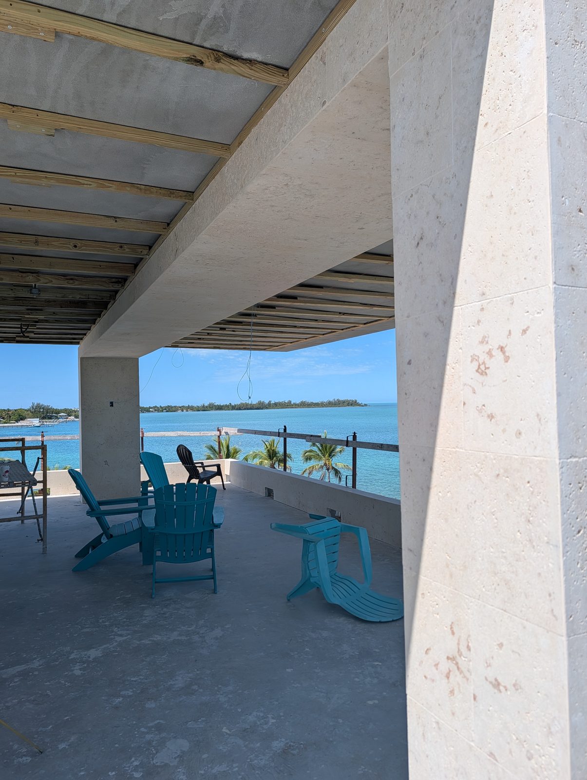 Coral stone pool deck on a 50,000 sq ft Islamorada, FL estate by Driveway & Paver Solutions