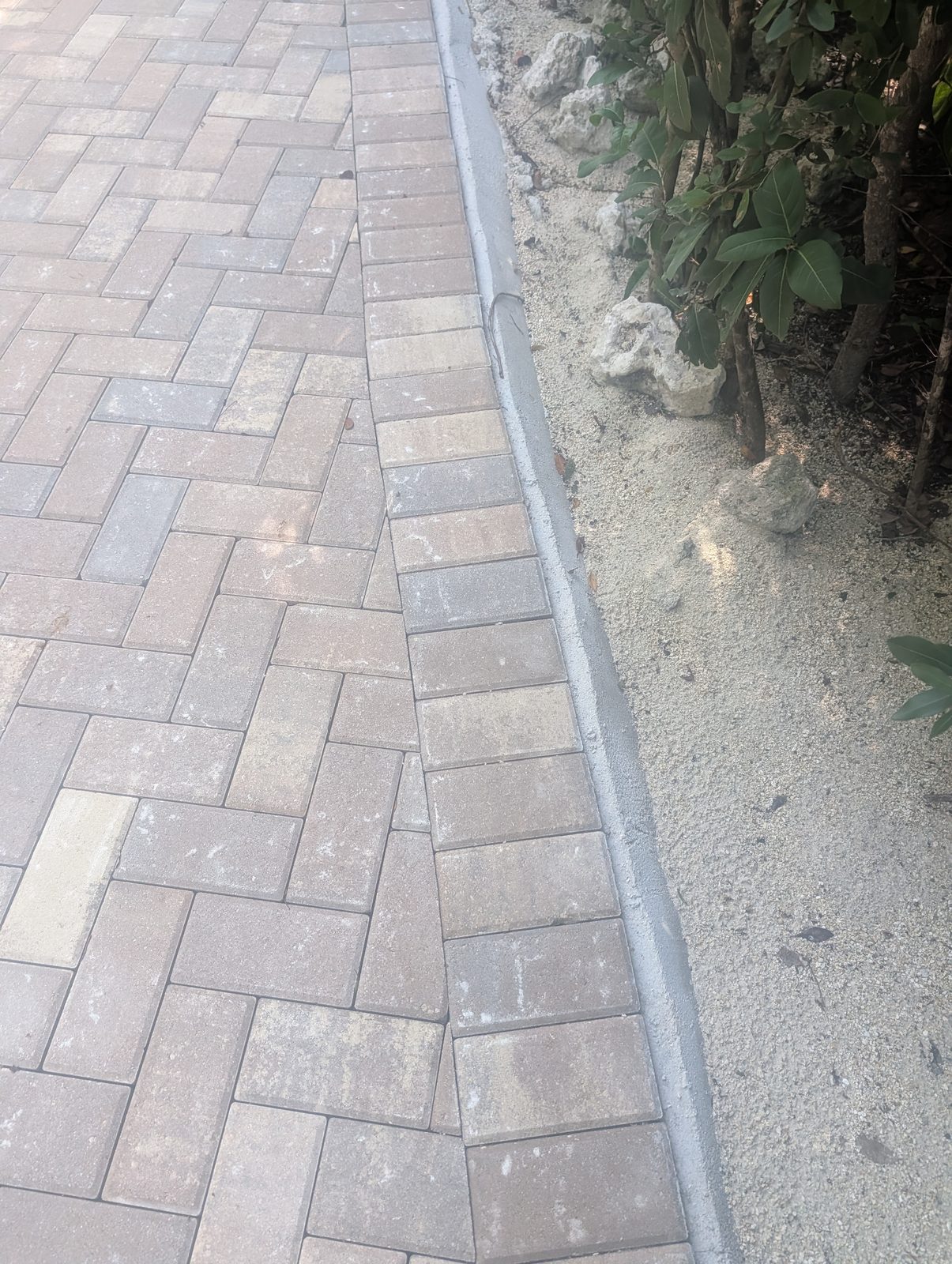 Coral stone walkway pavers on a 50,000 sq ft Islamorada, FL estate by Driveway & Paver Solutions