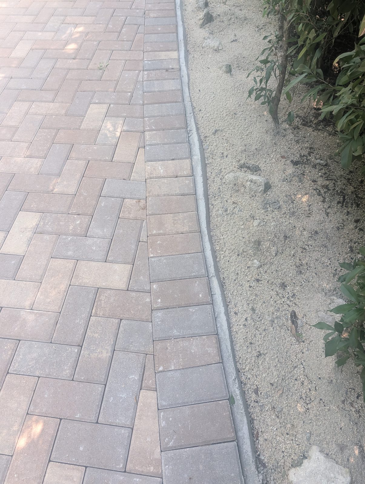 Coral stone walkway pavers on a 50,000 sq ft Islamorada, FL estate by Driveway & Paver Solutions