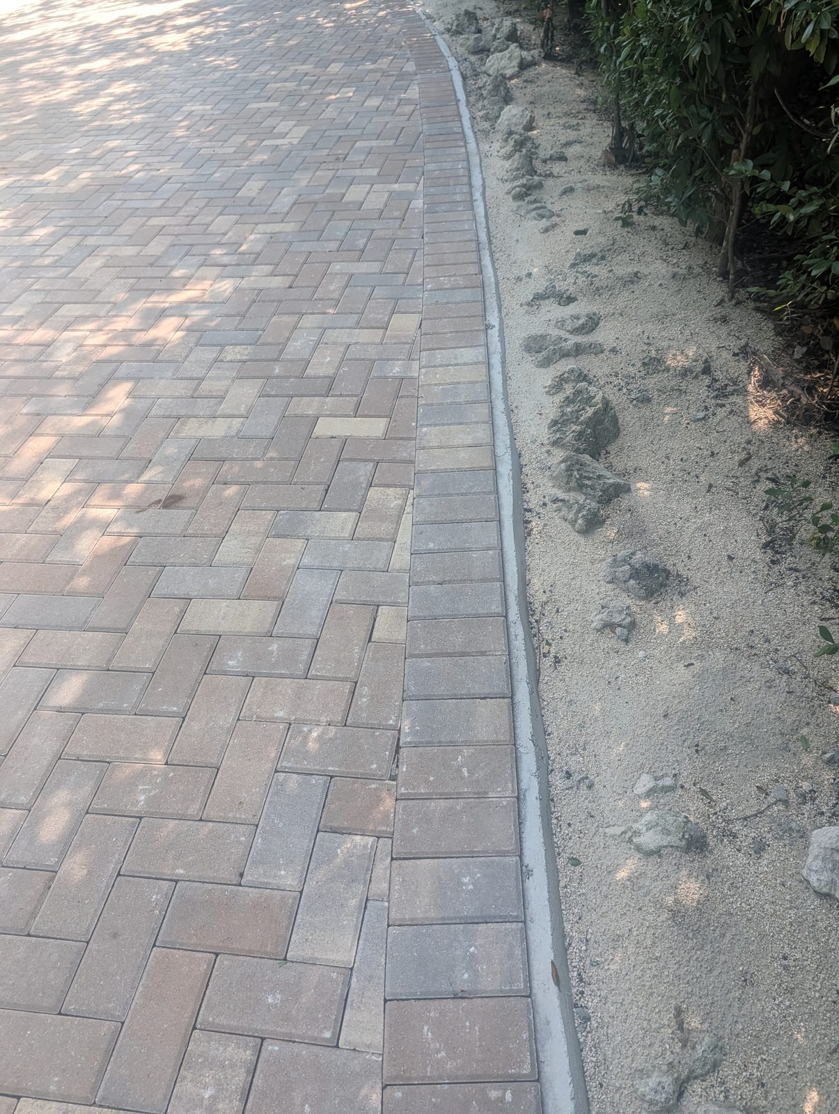 Coral stone walkway pavers on a 50,000 sq ft Islamorada, FL estate by Driveway & Paver Solutions