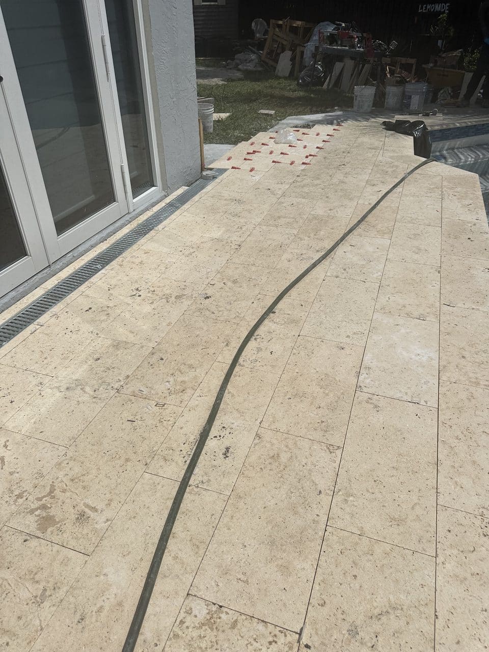 Pool Deck Pavers project in Kendall, FL by Driveway & Paver Solutions