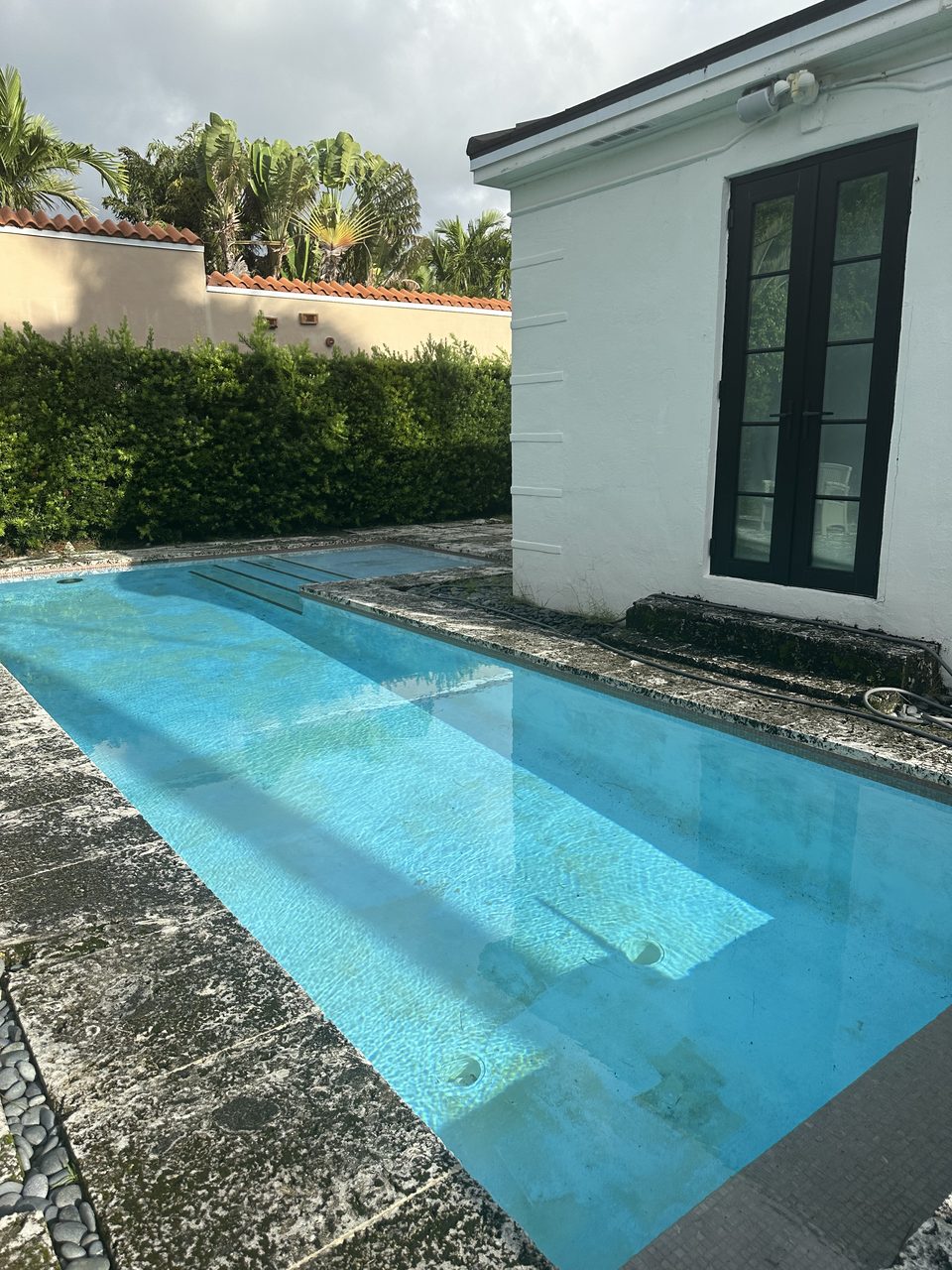 Pool Deck Pavers project in Miami Beach, FL by Driveway & Paver Solutions