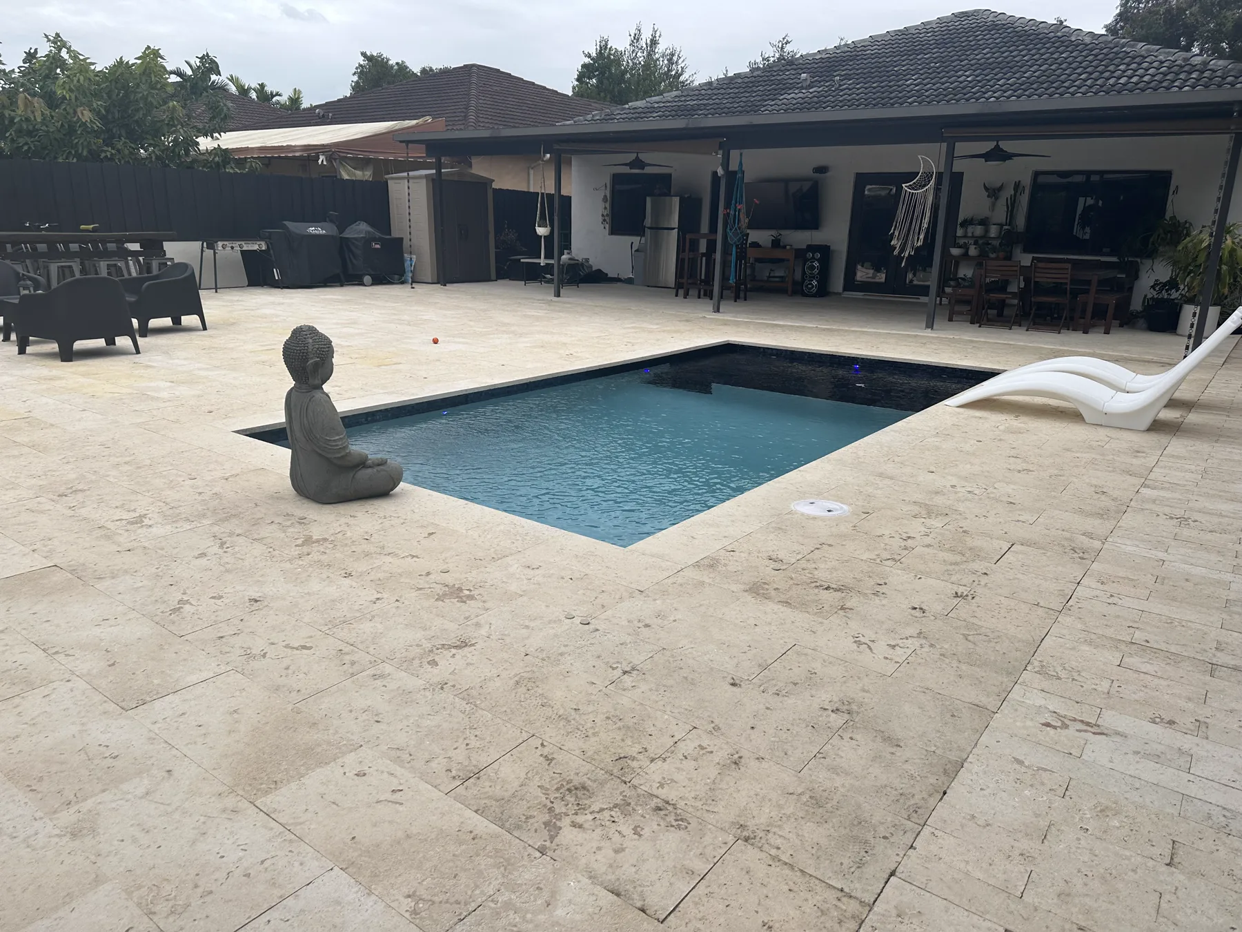 Completed 1,700 sq ft coral stone pool deck at a South Miami home