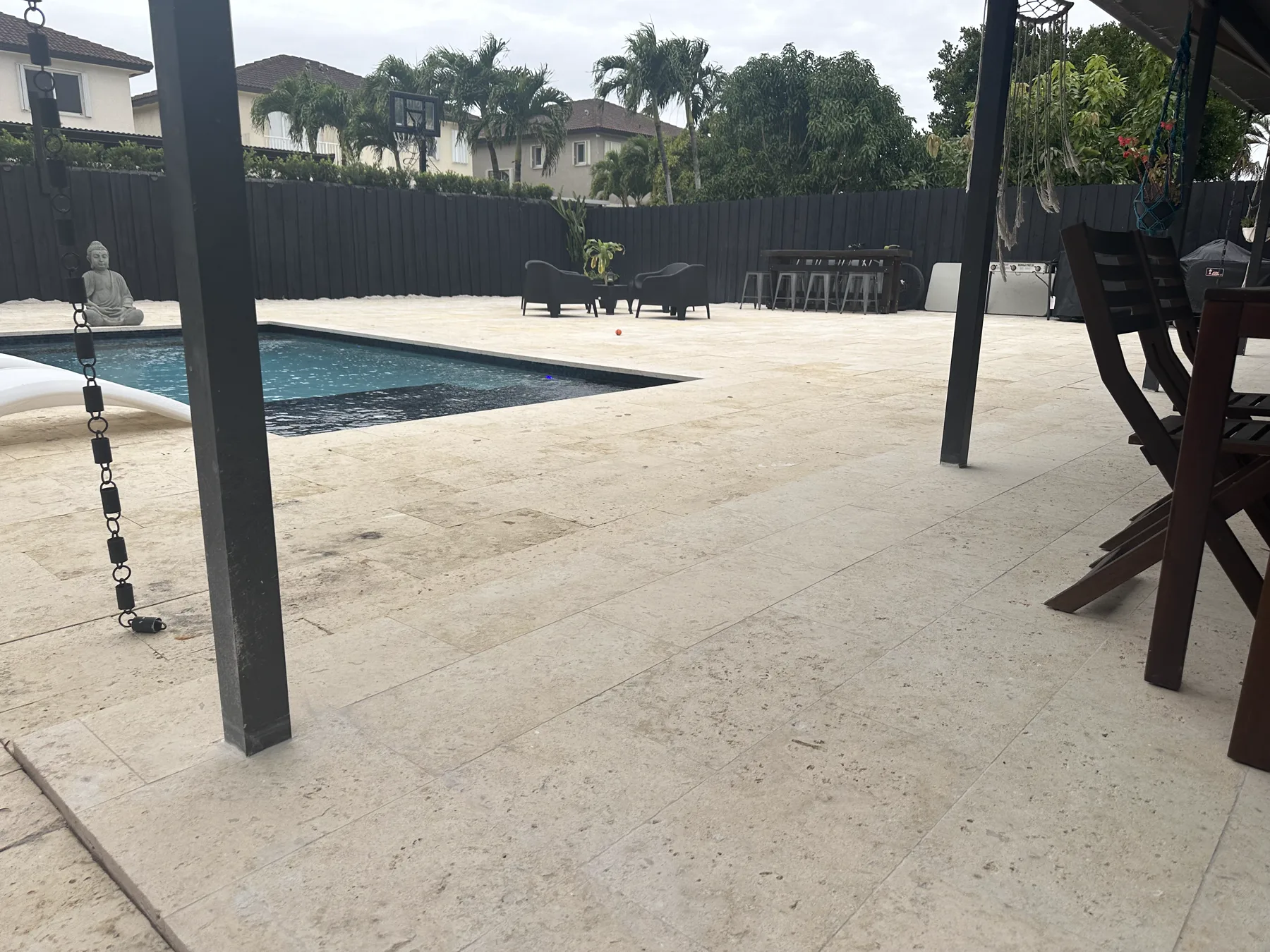 Covered patio opening onto the completed coral stone pool deck