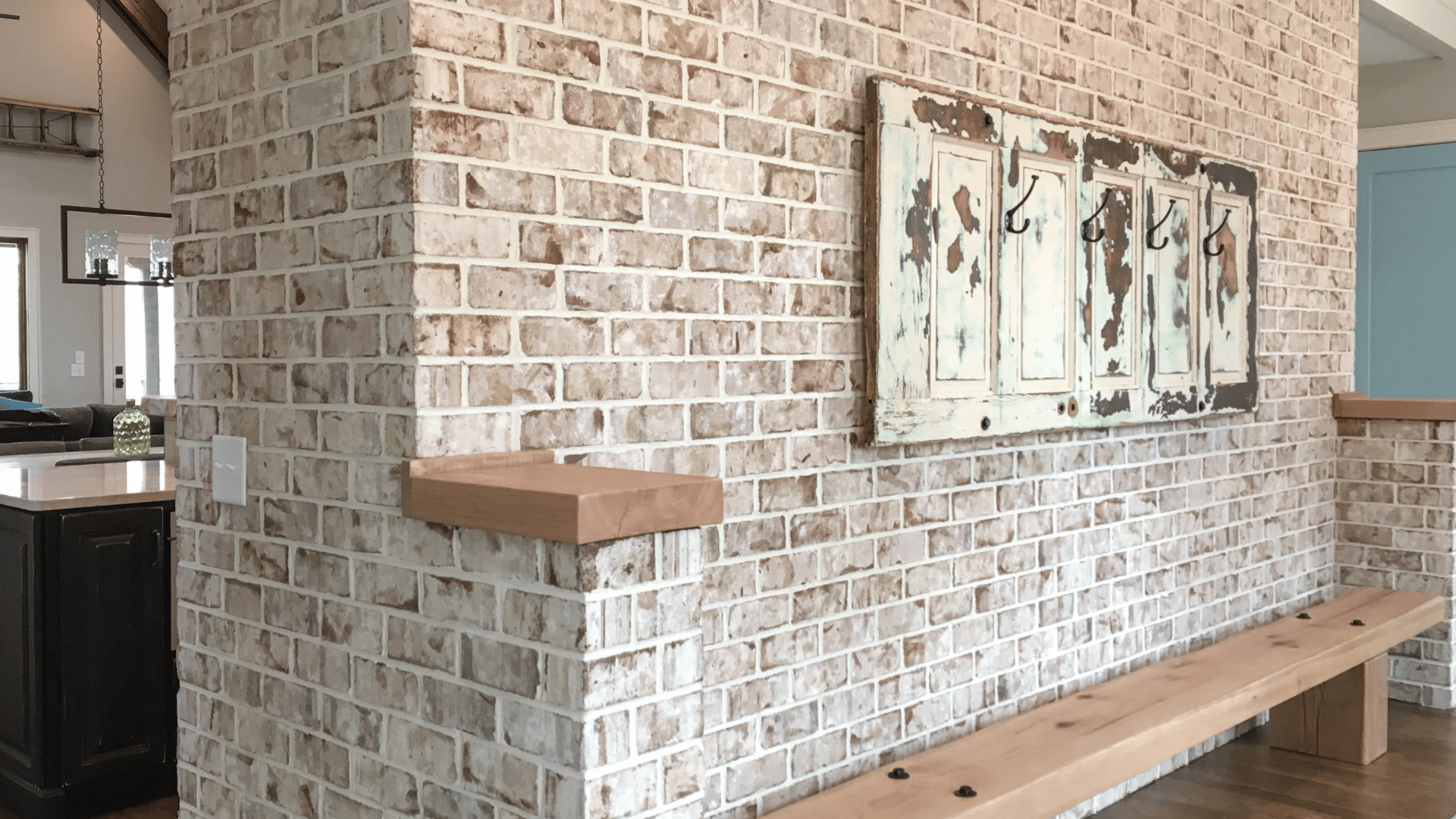 Elegant wall featuring thin brick veneers.