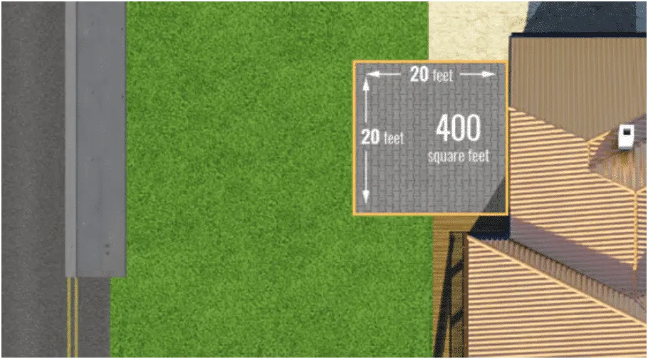 Overhead view graphic showing a 20 ft by 20 ft (400 square feet) gray paver area on a lawn next to a building, used for cost calculation.