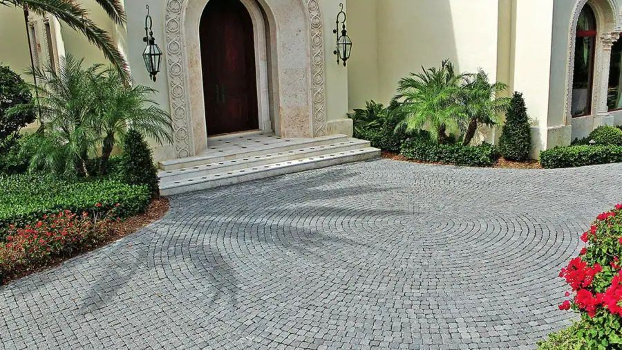 Curving driveway with multi-toned pavers