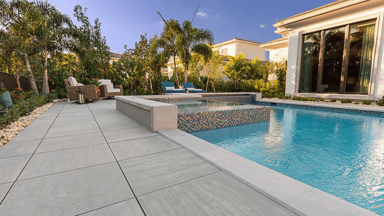Custom pool deck lighting and paver design Kendall