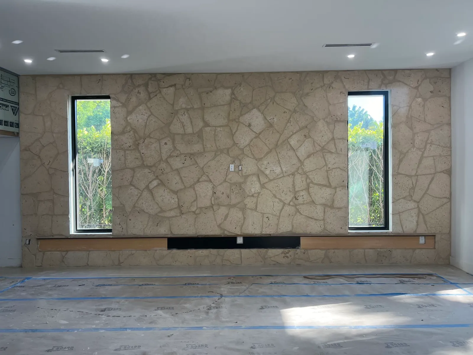 Rustic stacked stone retaining wall cladding South Miami