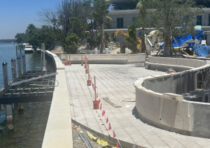 Seawall renovation with coral stone by Driveway & Paver Solutions at Bal Harbour Village