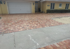 Completed Chicago brick driveway project in a suburban setting.
