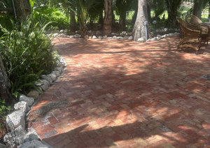 Smoothly paved sidewalk by Driveway & Paver Solutions, ensuring safe and stylish pedestrian pathways.