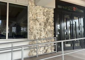 Masterfully constructed stone wall by Driveway & Paver Solutions at Delray Beach Club, reflecting unmatched craftsmanship.